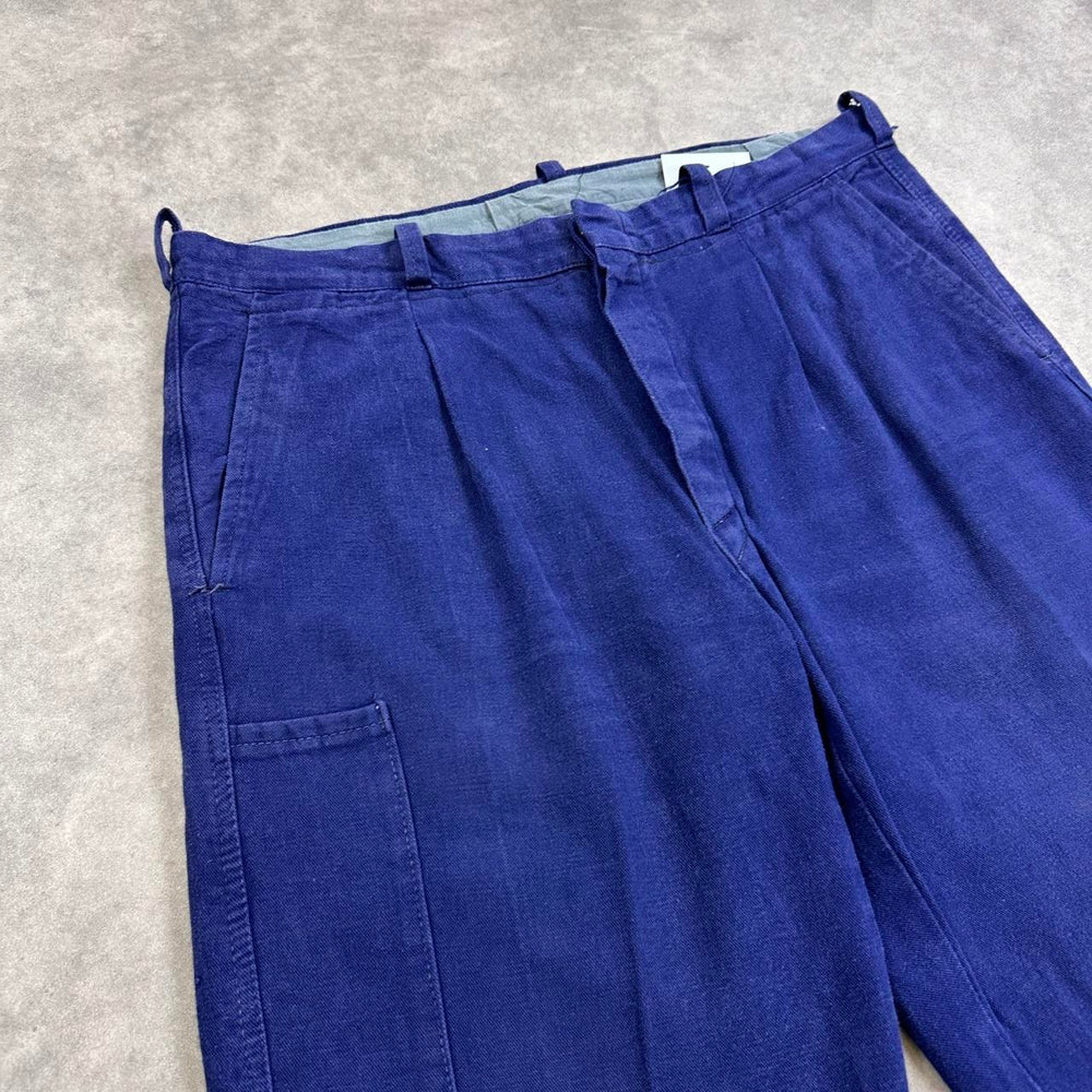 Navy blue trousers with a relaxed fit