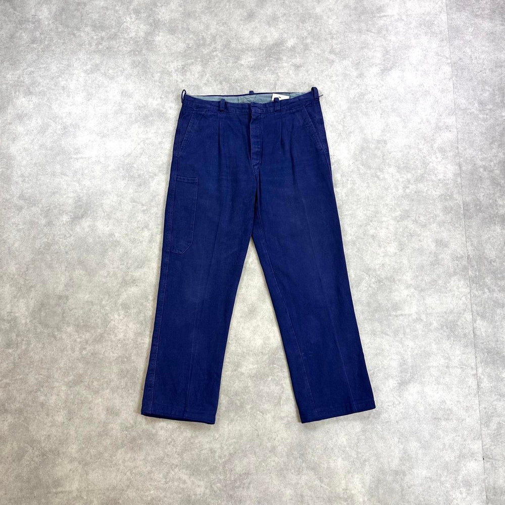 Navy blue trousers with a relaxed fit