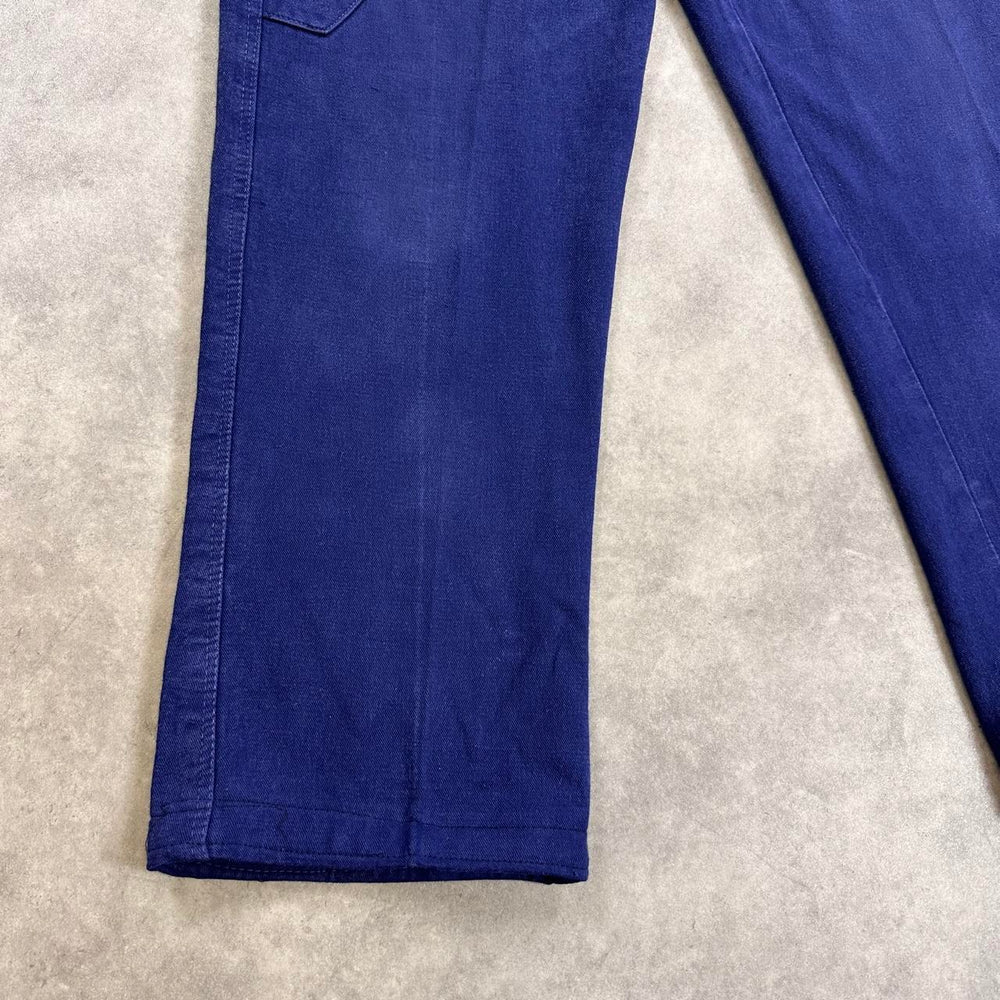 Navy blue trousers with a relaxed fit