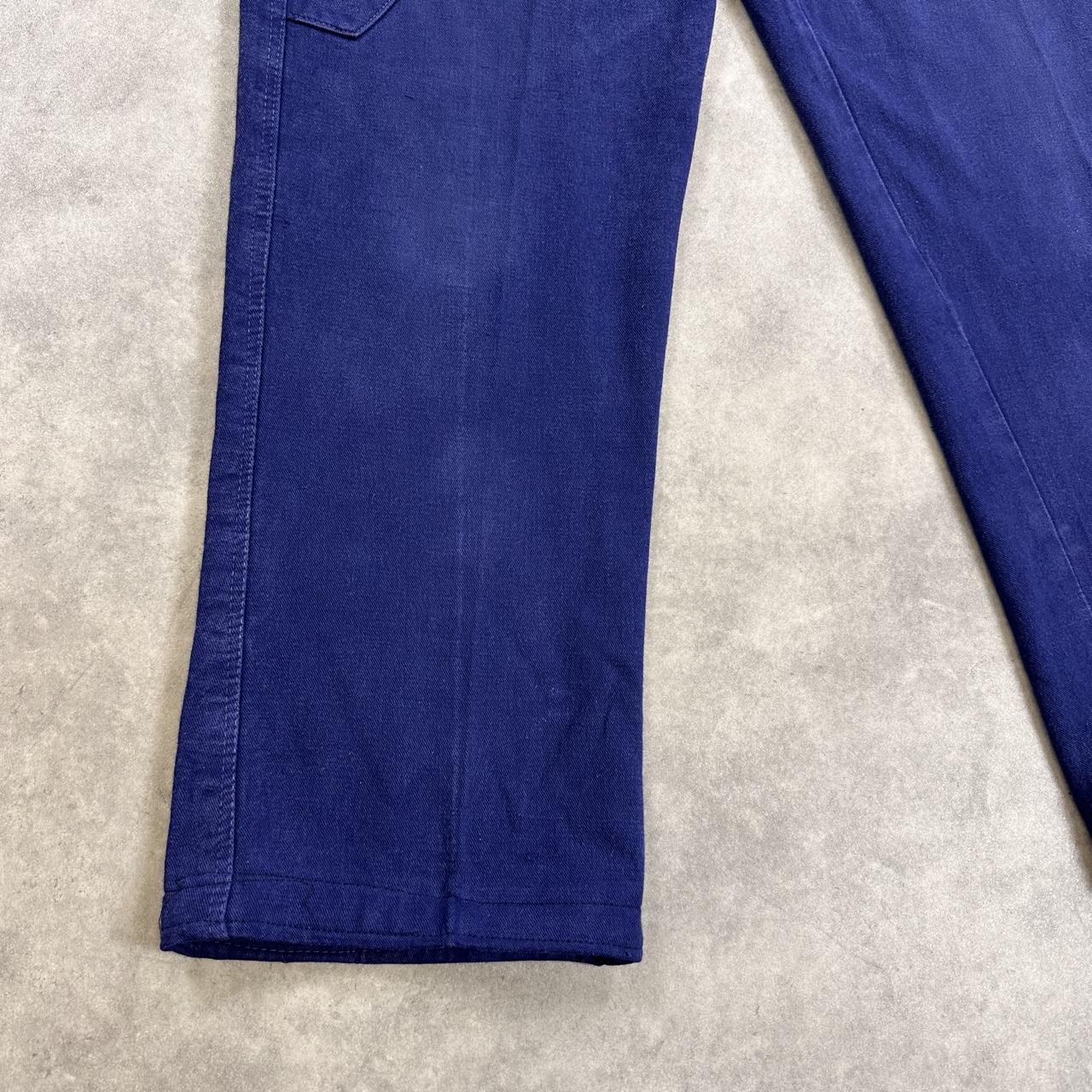 Navy blue trousers with a relaxed fit